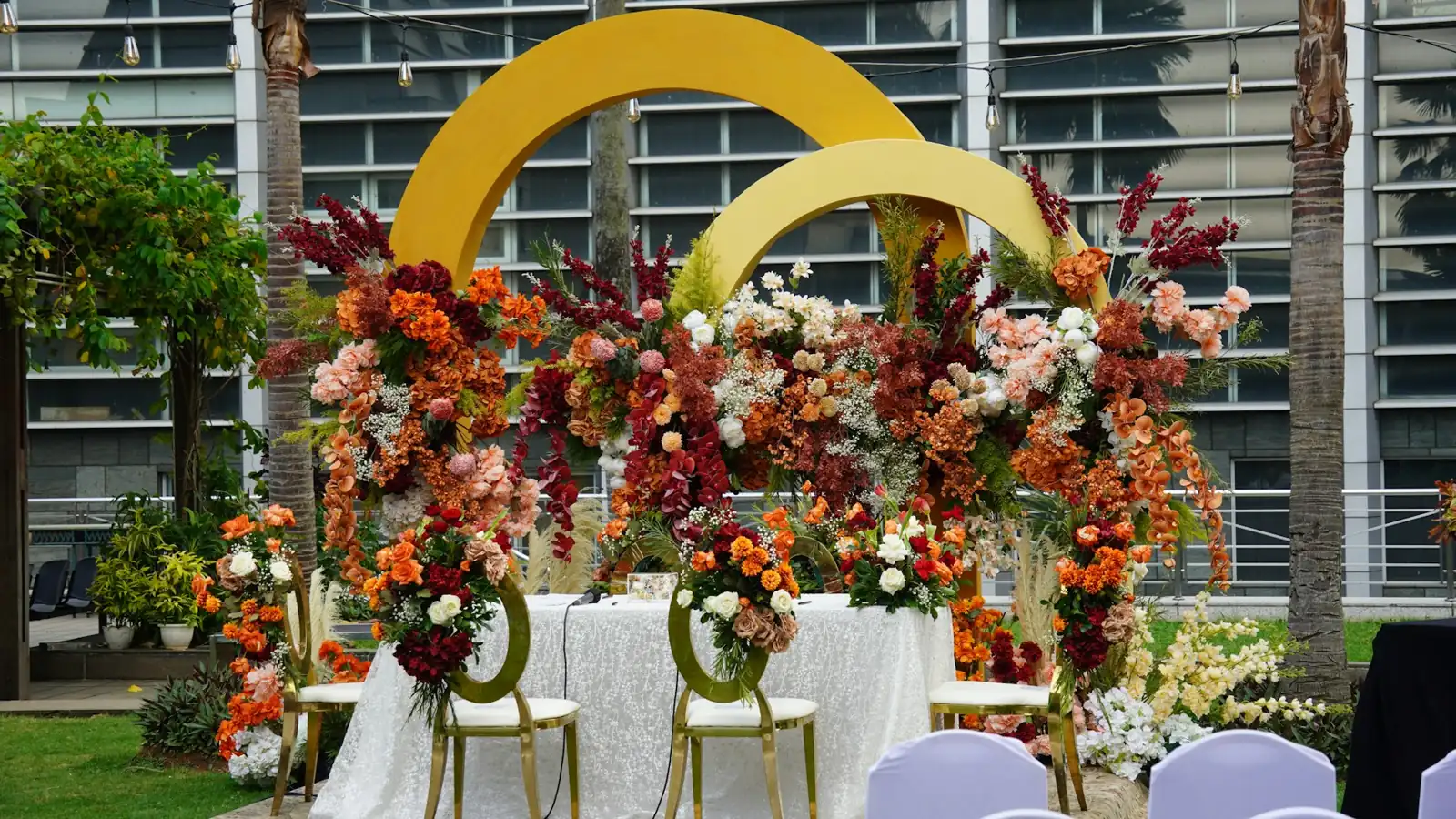 Outdoor floral wedding décor and seating