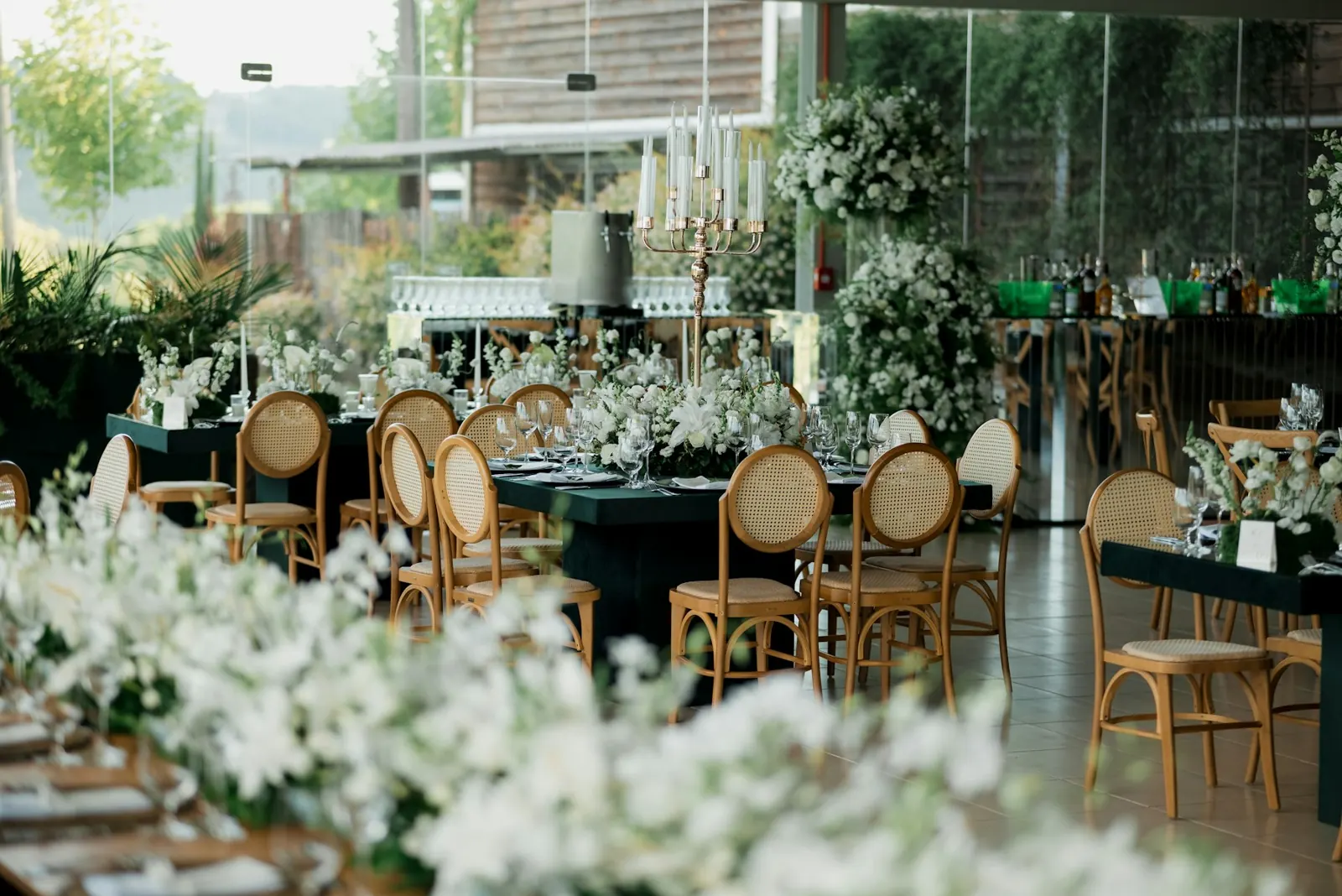 Wedding reception table décor with white florals